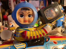 Grainy disposable camera footage of 1980s toys