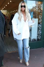 The color edited photo was taken of khloe during a private family gathering and posted to social media without permission by mistake by an assistant, tracy image captionsisters kim, kourtney and khloe kardashian. Khloe Kardashian Pops Backside In Jeans From Her Good American Brand Hollywood Life