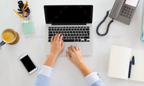 Hands Of Businesswoman Working On Laptop At Office