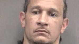 Suspect arrested in theft of UF swim coach's credit cards