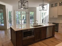 Kitchen Island Appliance The Dishwasher And A Built In Microwave Were Placed In The Islan Kitchen Island With Sink Build Kitchen Island Interior Design Kitchen