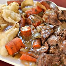 While the potatoes cook, place the carrots and ¾ of the thyme in a bowl. Slow Cooker Pot Roast Recipe Small Town Woman