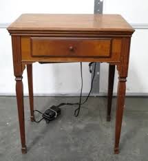 Singer sewing machine model 221 working order, perfect condition the singer featherweight model 221 was made exclusively at the company's kilbowie plant in scotland. Vintage Singer Sewing Machine W Cabinet United Country Musick Sons