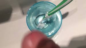 Cum on her toothbrush - ThisVid.com