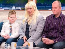 Boy born without a brain defies huge odds to live after it 'grew back'