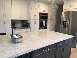 Using granite countertops on your cabinets is a fine way to achieve some level of uniqueness. Quartz Countertop Installation Featuring Pelican White Fossil Gray White Kitchen Quartz Counter How To Install Countertops Quartz Countertops