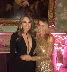 Liz hurley and white jeans go together like gordons and tonic. Liz Hurley Puts Her Cleavage On Display In A Very Revealing Dress Mirror Online
