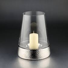 Candle holders, candle sconces, votive holders, hurricanes and tealight holders at modish helps create the perfect illumination for a romantic setting. Mercer41 Glass Tabletop Hurricane Glass Votive Candle Holders Glass Candlesticks Glass