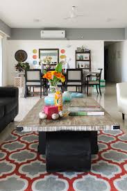 Centre modern furniture around a cubic rug. Modern Rustic Indian Design Home Chuzai Living