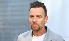 Dundee midfielder Callum Moore heads