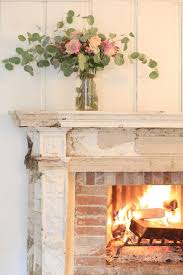 A repainted mora clock is a gorgeous find. Antique Fireplace Before After French Country Cottage