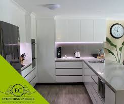 Modern Kitchen With Led Strip Lights Under Overhead Cupboards Really Brings Out Glamorous Bathroom Decor Bathroom Lighting Diy Cupboard Lights