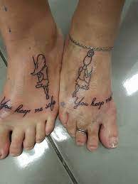 Matching mother and daughter tattoos on shoulder. Mother Daughter Foot Tattoos