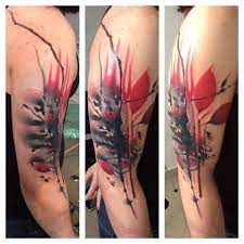 Completed in a black color, this design contrasts well with the skin. Amazing Red And Black Tattoo Idea Parryz Com
