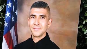 3rd suspect charged in killing of California officer