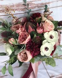 Gorgeous burgundy silk roses are brought together to make this exquisite toss bouquet. Pin By Kinga Sofalvi On Y Wedding Flowers Wedding Bouquets Bridal Bouquet