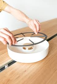 Good bed of ash works well. The Cooking Table Studio Moritz Putzier