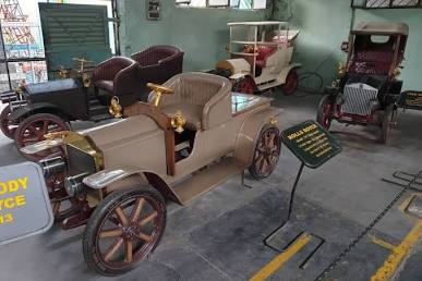 Quirky custom vehicles at Sudha Cars Museum, AI generated