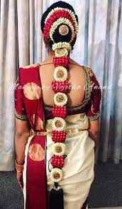 When it comes to a traditional indian wedding, you can never go wrong with a simple and sleek bun. South Indian Bridal Hair Braids Bridal Hairstyle Hair Accessories Fresh Flowers Saree Blouse Bridal Wedding Hair Indian Bridal Hairstyles Boho Hairstyles