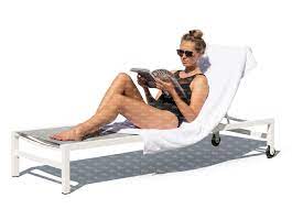 Beach style chairs ukrainian women. Woman Lying On The Beach Chair And Reading Vishopper