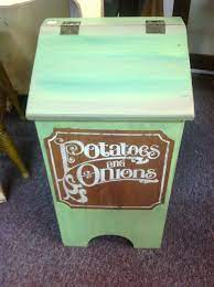 I repainted the whole thing with antique white milk paint. Painted Vintage Potato And Onion Bin Love The Colors Upcycle Repurpose Potato Bin Potato And Onion Bin