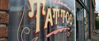 Billed as one of the friendliest portland tattoo shops, grizzly tattoo welcomes visitors beneath its glowing red. Portland Tattoo Parlor New Rose Tattoo