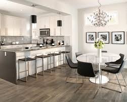 Think exposed duct work or pipes, metal furniture, exposed brick…gray hardwood floors of medium to darker grays work very well with this type of style. Grey Wood Floor Kitchen Design Home Architec Ideas