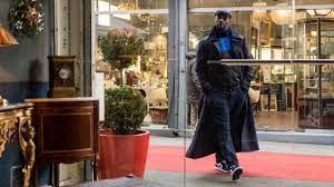 I used several props from the film series such as photographs, a drone, one of lupin's books, an orange hat, etc. The Beret Flat Cap Grey Of Arsene Lupin Omar Sy In Arsene Lupin Season 1 Spotern