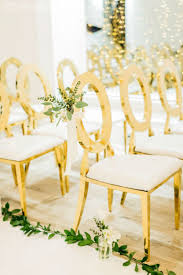 An Earthy Wedding For The Glam Bride Elegantwedding Ca In 2020 Gold Wedding Ceremony Wedding Ceremony Chairs Gold Wedding Chairs