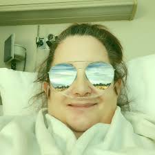 The face is droopy but the smile peeks through!! Getting my 6-pack of  albumin to suck those pesky MuSk antibodies out of me. Thankful for my team  here at Detroit Medical Center!!