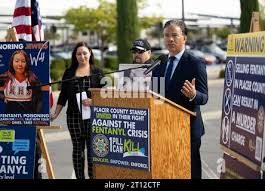 Roseville, CA, USA. 10th Oct, 2023. Jacob Chavez and Johnny Tabular hold  photographs of their niece Jewel Marie Wolf with mother of victim Regina  Leah Chavez after the sentencing of Nathaniel Evan