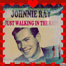 This reminds of the old Johnnie Ray tune "Just a walking in the rain ~  gettin soaking wet...." Here we see Marilyn Sue Fronabarger, left, and her  sister Faye Ellen Fronabarger enjoying