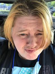 The hairstyle is parted down the middle with curtain bangs framing either side. My Eboy Bangs I Need A Hair Cut Bigonemild