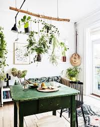 Mixing dark, moody rendered walls with duck egg blue cabinetry is an edgier take on the boho coastal style. 35 Boho Kitchen Decor Ideas Momooze Com