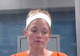 Records: Mother charged after man uses heroin in car in front of woman's  infant