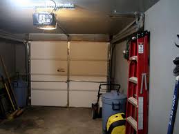 Why does the garage door light stay on? Install Electric Garage Door Opener Hgtv