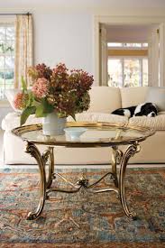 A coffee table is the focus of any living room furniture layout and creates the perfect spot for entertaining. Coffee Tables Coffee Tables And Entertaining Spaces Table Decor Living Room Coffee Table Living Room Modern Decorating Coffee Tables