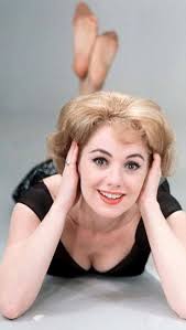 Shirley Jones is a renowned American actress and singer, famous for her  roles in classic musicals like Oklahoma! and The Music Man, as well as her  iconic portrayal of Shirley Partridge in