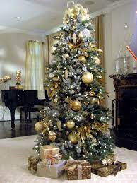 These are decorated with lights and gold, silver, red, and green bulbs. Create A Designer Christmas Tree Hgtv