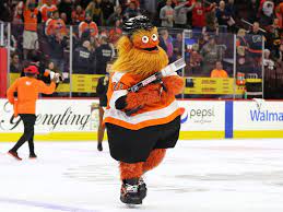 Flyers Mascot Takes Hockey World By Storm Mascots Hockey World Hockey Philly Sports