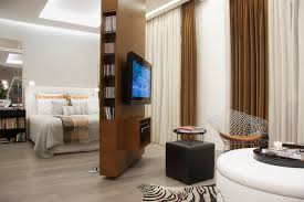 A television is a necessary fixture in many living rooms. 10 Ways To Place The Tv In Your Bedroom