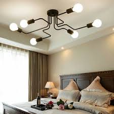 This primary bedroom is illuminated by contemporary table lamps and a crystal flush mount ceiling light that hung over the leather bed. Flush Mount Ceiling Lights Bedroom Pendant Light Black Kitchen Pendant Lighting Ebay
