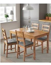 Chairs are smoke grey plastic and legs are chrome plated. Price For Jokkmokk Dining Set Table 4 Chairs Ikea In Kuwait