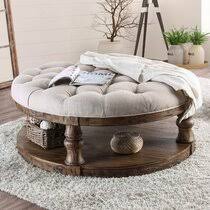 This large faux leather storage ottoman offers an easy and stylish storage solution for pillows, blankets, books or toys. Round Upholstered Coffee Tables You Ll Love In 2021 Wayfair