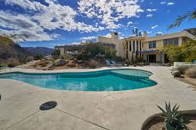 (she heads there next week for a charity event; House Of The Week A Gucci Heiress Desert Retreat Wwd