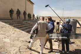 General Wayne A. Downing and Anchor and Managing Editor, Brian... News  Photo