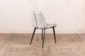They also come in different colors: Faux Leather Dining Room Chairs Peppermill Interiors