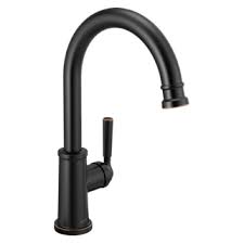 It is a high rise/neck, with a pull out nozzle/sprayer, and it has a single lever & and soap dispenser. Single Handle Faucets