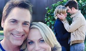 Parks And Recreations' Amy Poehler and Adam Scott share a sweet kiss Rob  Lowe marks his last day