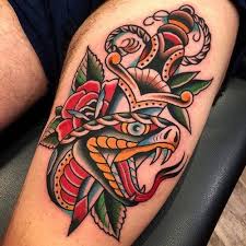 A snake tattoo is one of the coolest and most badass designs out there. American Traditional Tattoos History Meanings Artists Designs